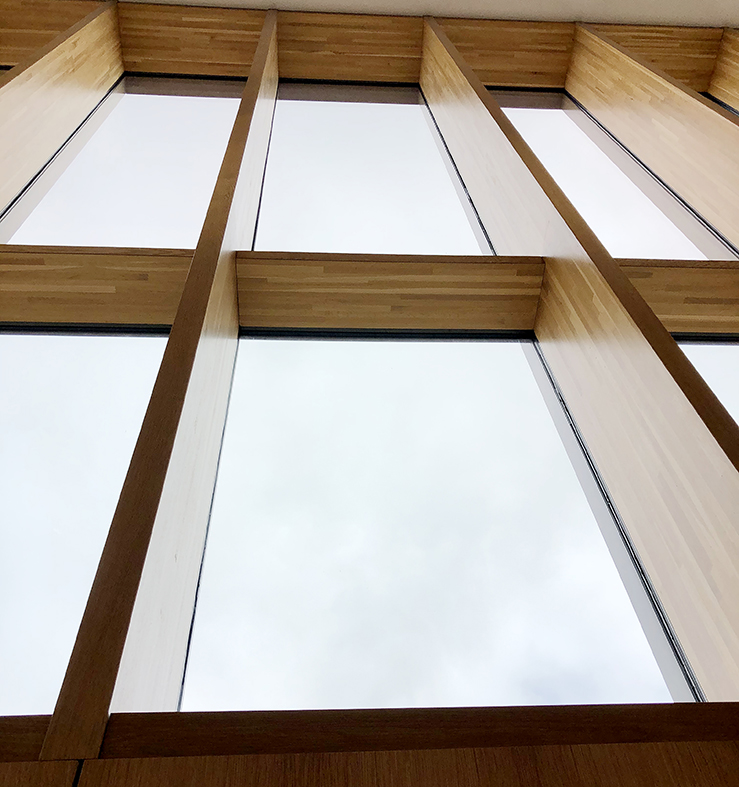 Two wood curtain wall systems