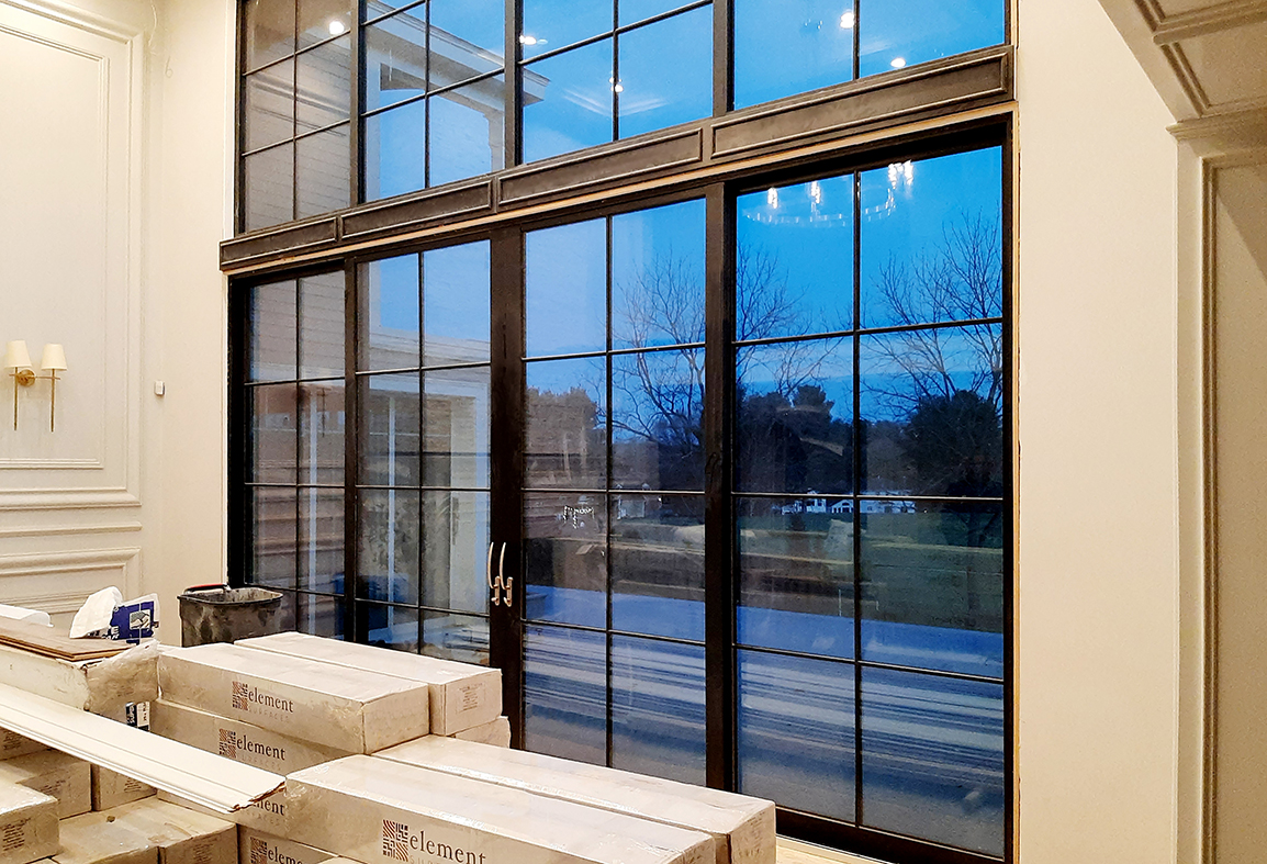 One four-panel Lift-Slide Door system with matching transom