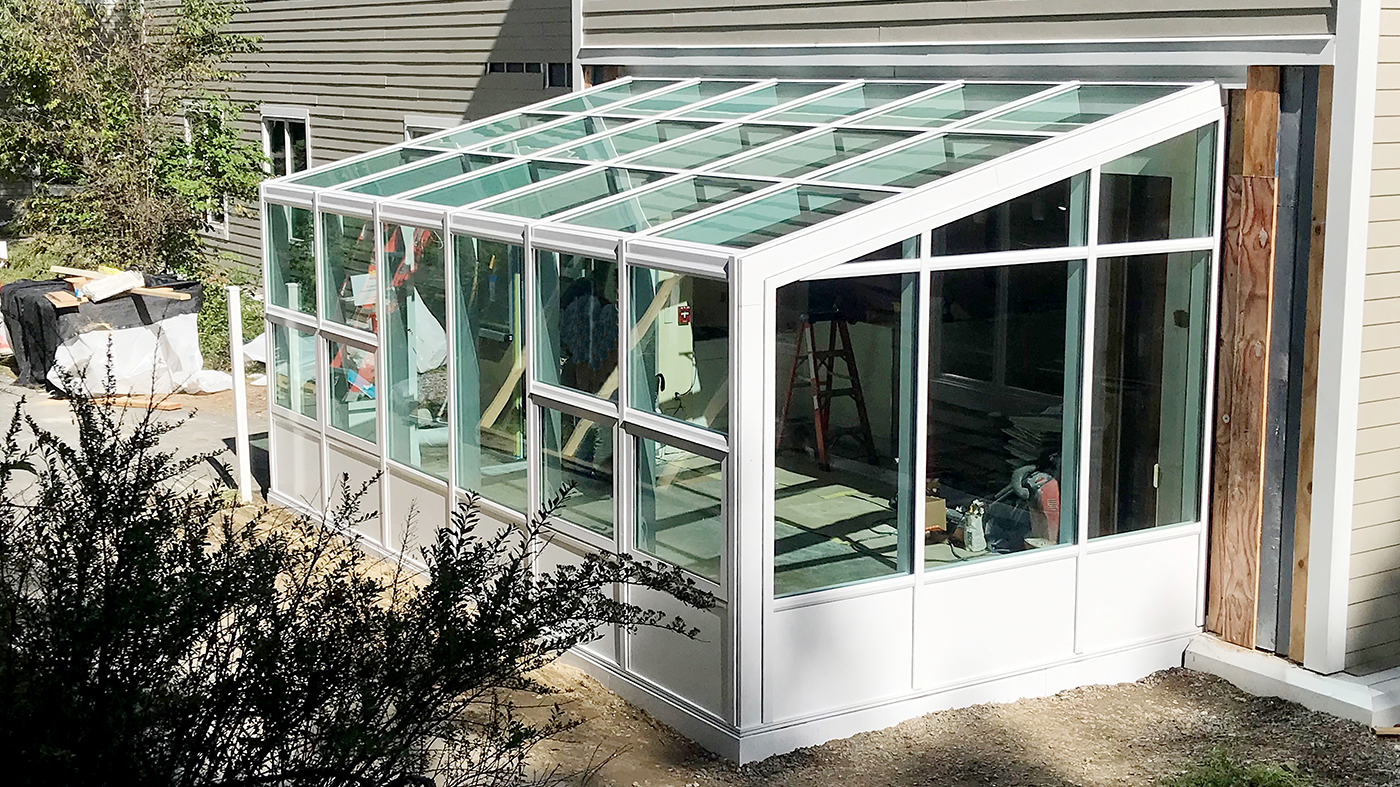One sunroom with four awning windows and a G2 outswing terrace door.