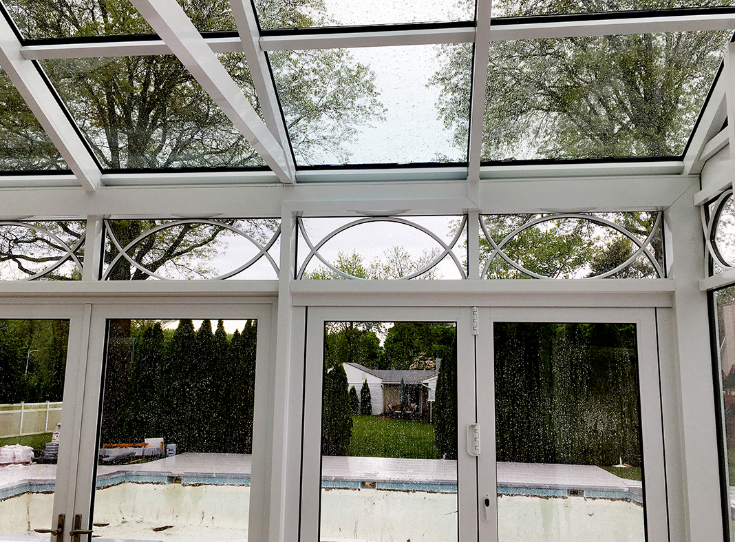 Conservatory with radius grids in transom