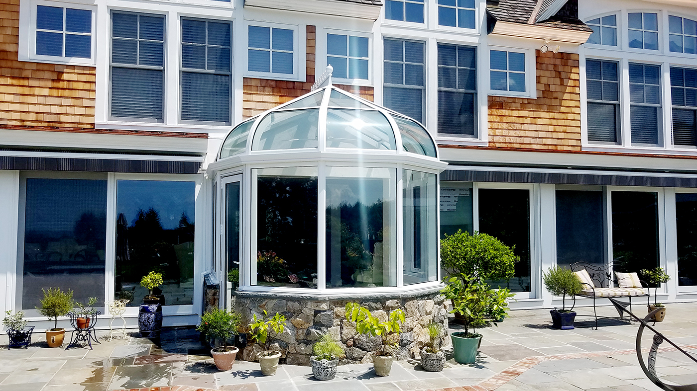Curved eave double pitch sunroom