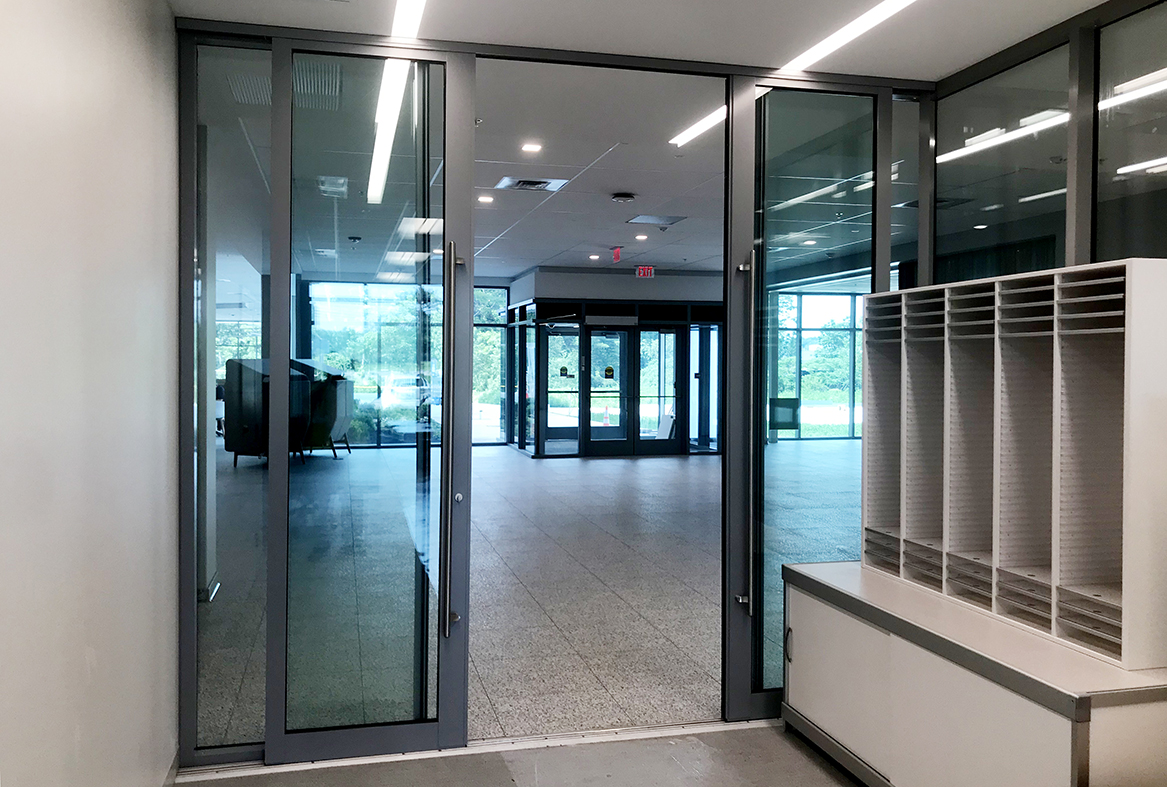 Aluminum curtain wall with integrated sliding glass doors
