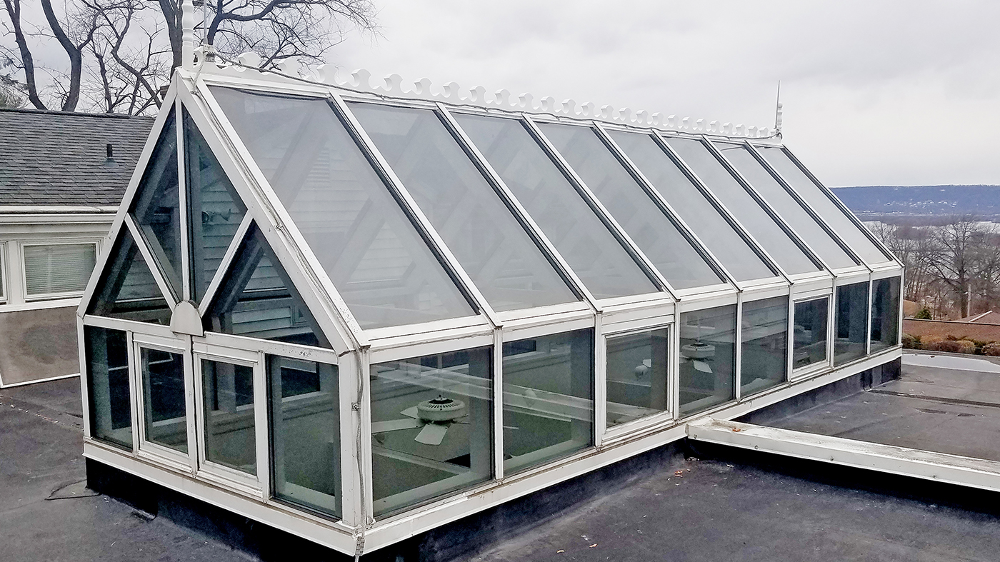 Straight eave double pitch skylight with awning windows