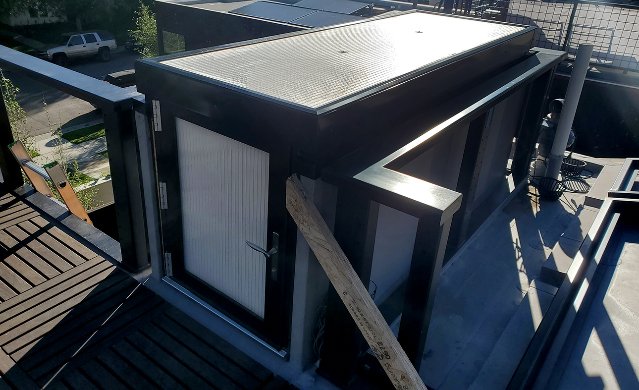 85-90 degree operable skylight with terrace door. Infill is 25mm Clear Lumira Aerogel Polycarbonate