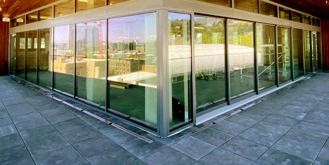 Multi-track sliding glass doors