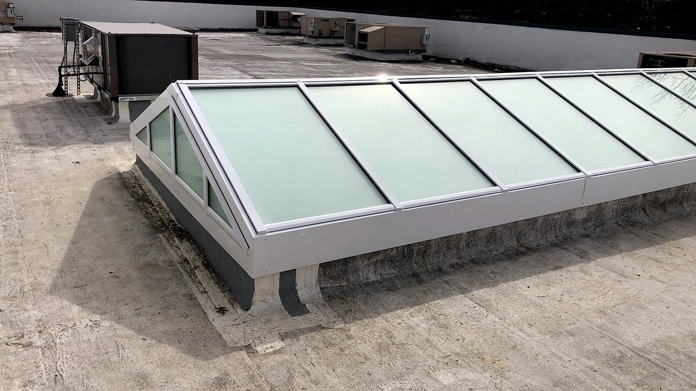 Double pitch skylight with satin etched glazing