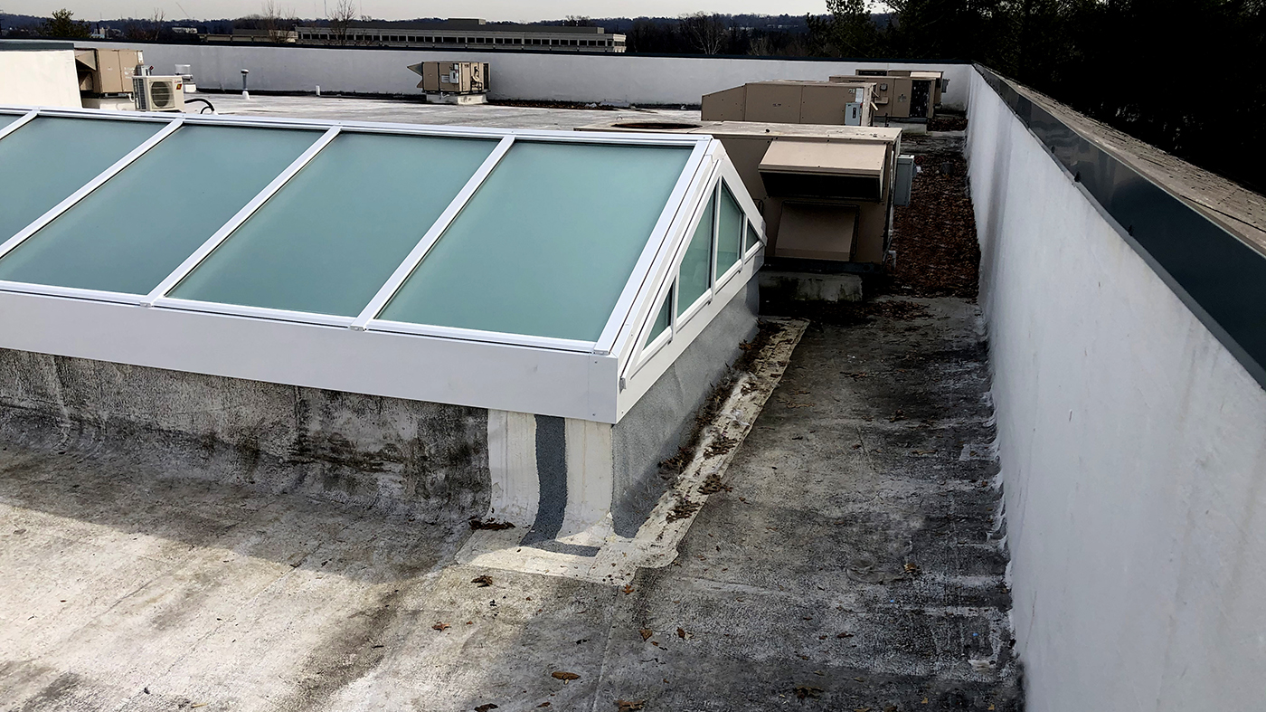 Double pitch skylight with satin etched glazing