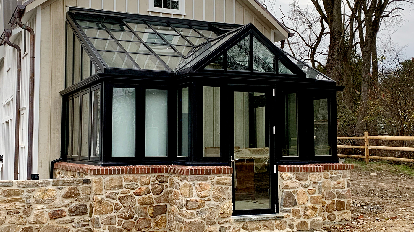 Straight eave lean to sunroom with a dormer entryway