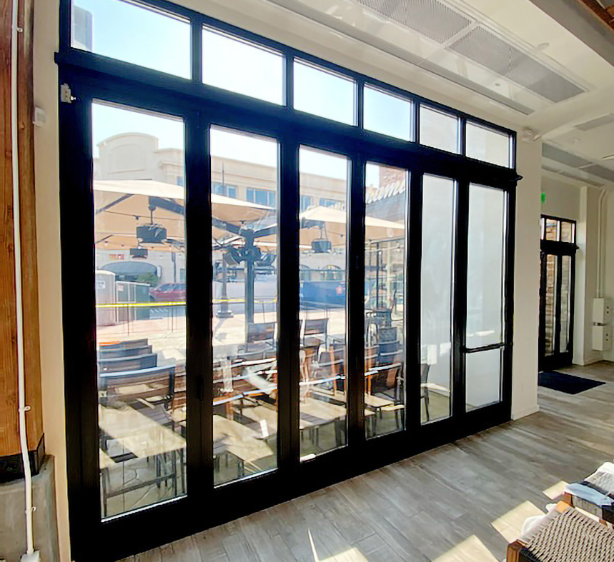 Six Bifold Door Systems with Transoms