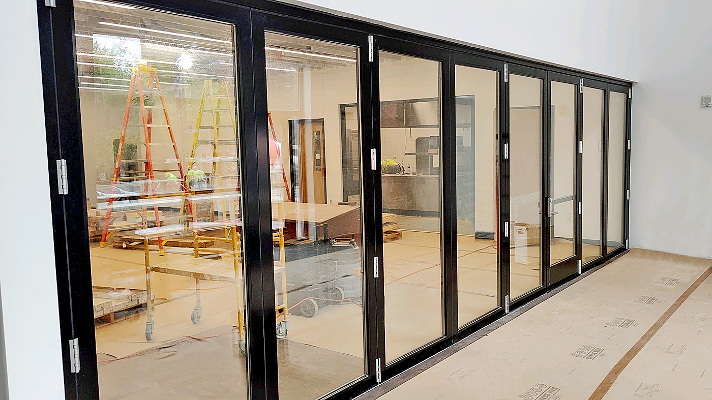 One G2 outfold eight-panel single door mid-wall (SDMW), one three-panel and one four-panel G2 infold all-wall, and one 2 1/2 panel G2 center pivot all-wall bifold door units.