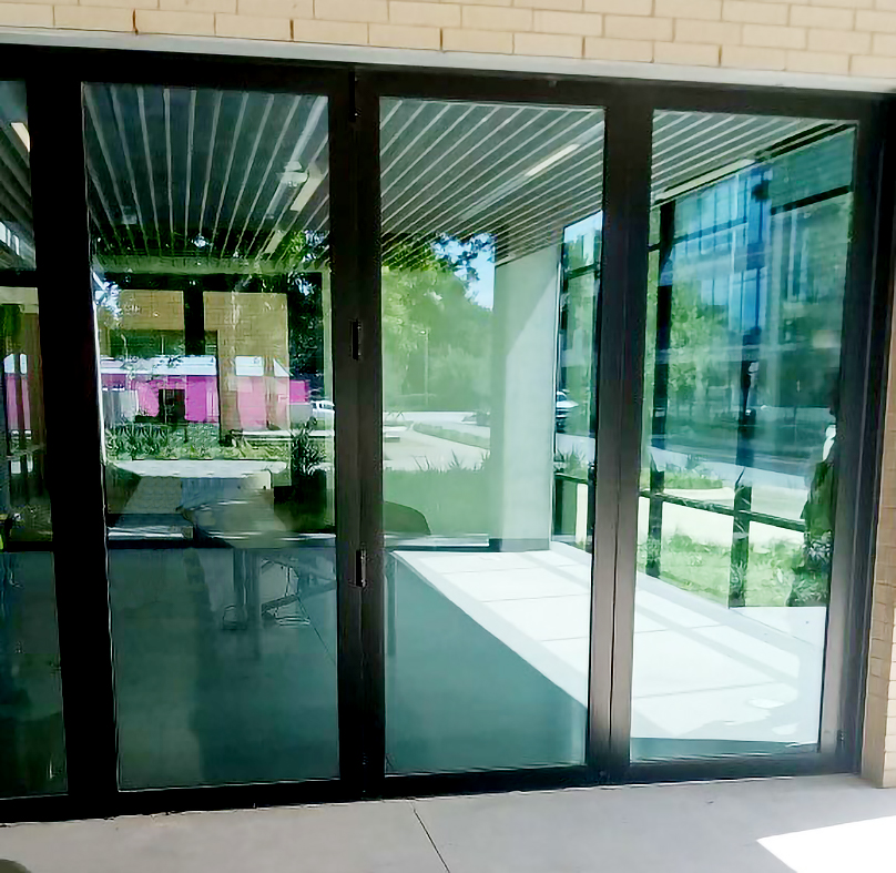 One Standard Bifold door system and one No Corner Post Bifold door system