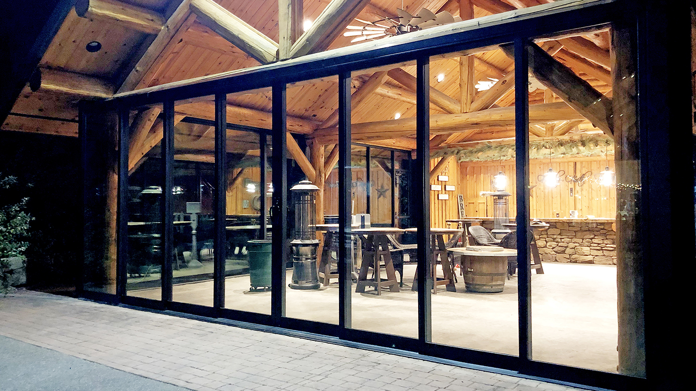 Four multi-track sliding glass door systems
