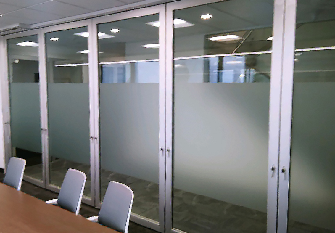 Three Slide and Stack Wall Systems; two with partially frosted glazed panels