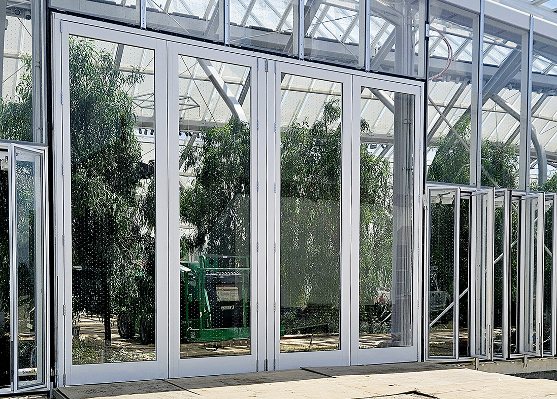 One four-panel G3 outfold split-wall 15 ft. tall bifold door unit with bird-safe glass with a dotted pattern throughout.