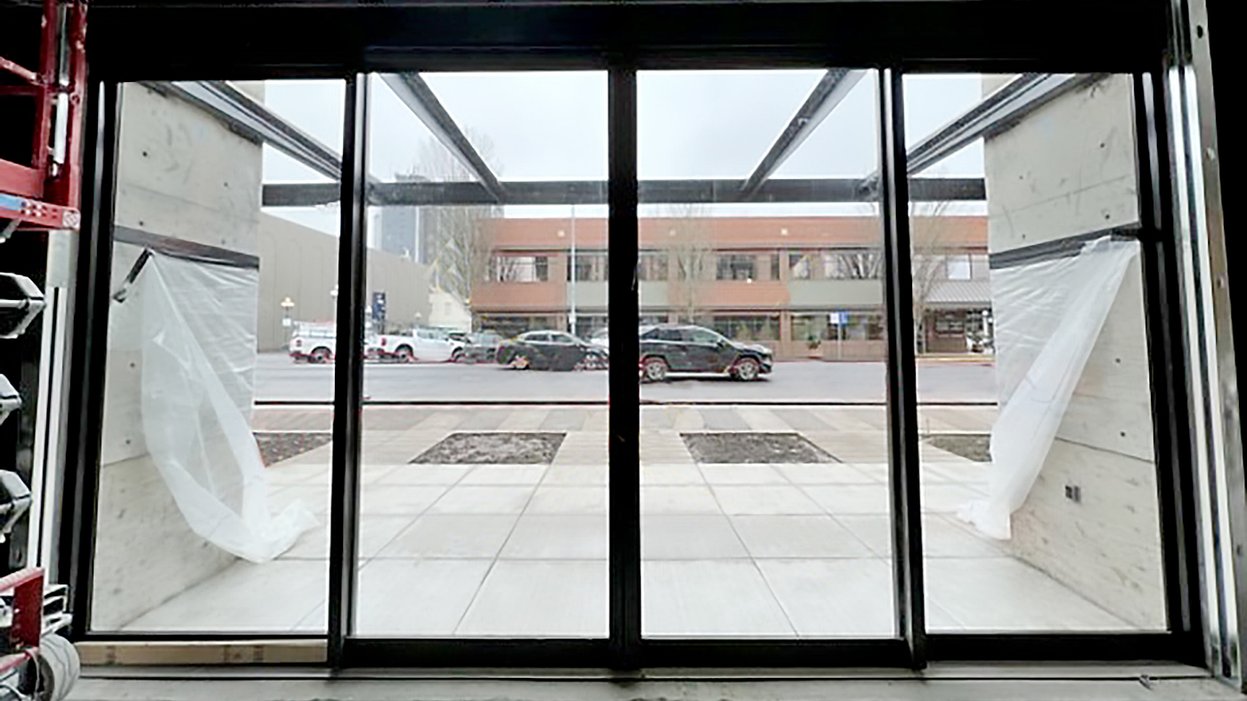 Two four-panel (OXXO configuration) G2 multi-track sliding glass door units.