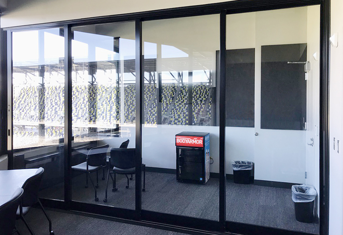 One four-panel OXXO configuration) G2 multi-track sliding glass door unit (pictured) and two two-panel (XX configuration) G2 multi-track sliding glass window units.