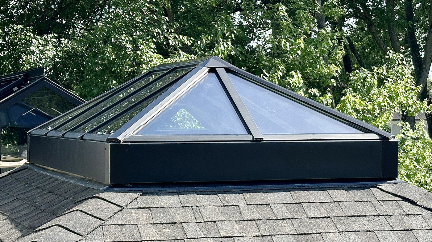Straight eave double-pitch greenhouse and a straight eave double-pitch hip-end skylight.