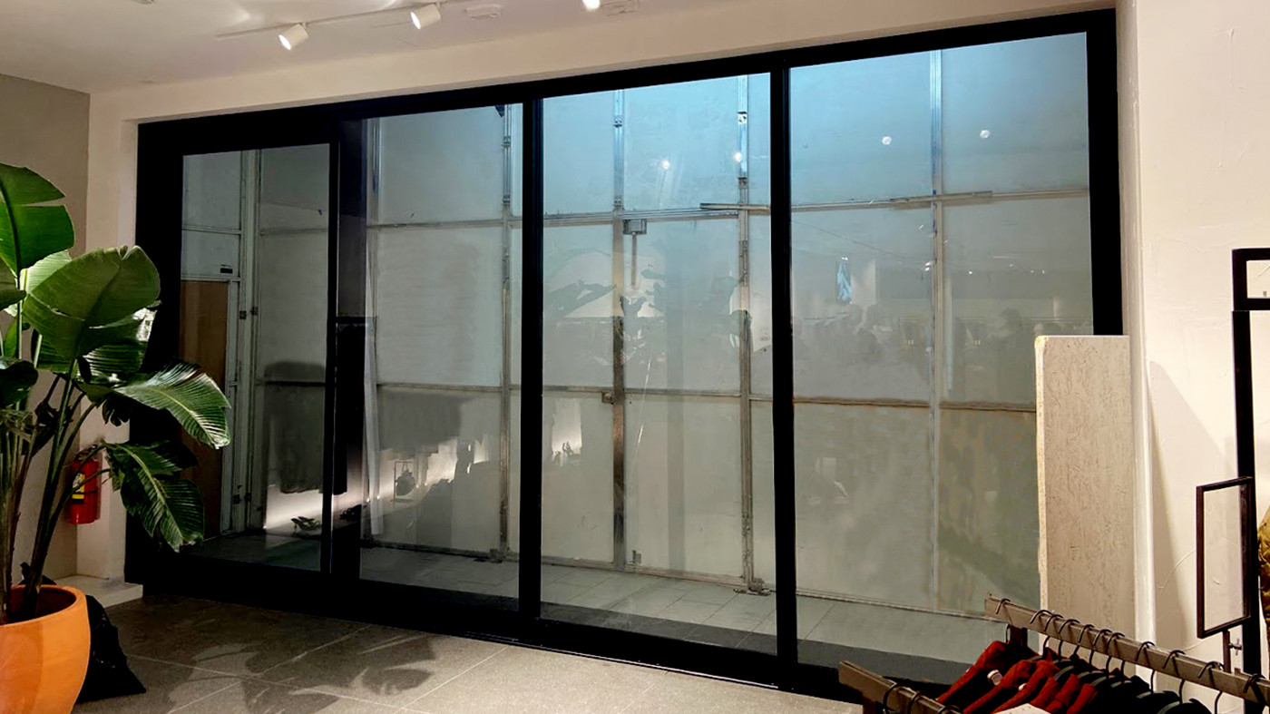 Multi-track sliding glass doors