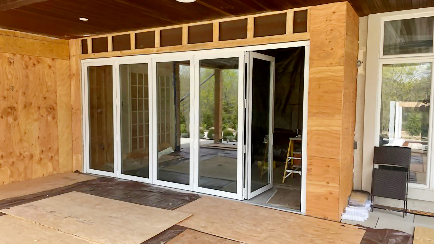 One five panel (all wall, all panels stack to the left) bifold door unit