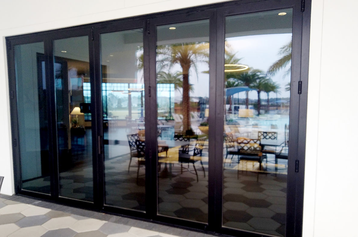 One five-panel and two three-panel bifold door units