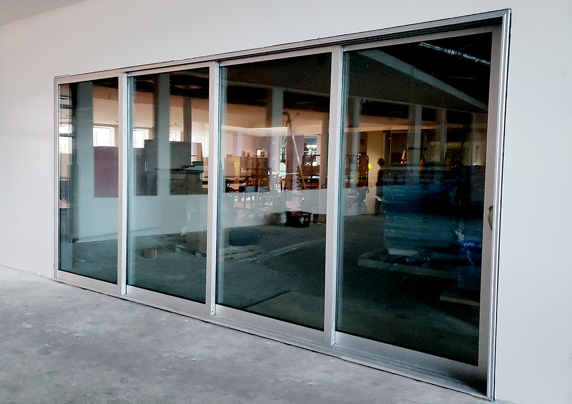 Five two-panel (OX & XO configurations), three four-panel (OXXX & XXXO configurations) multi-track sliding glass door units.