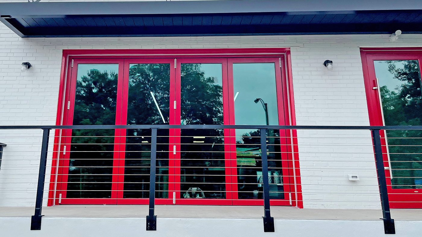 Red four-panel bifold door