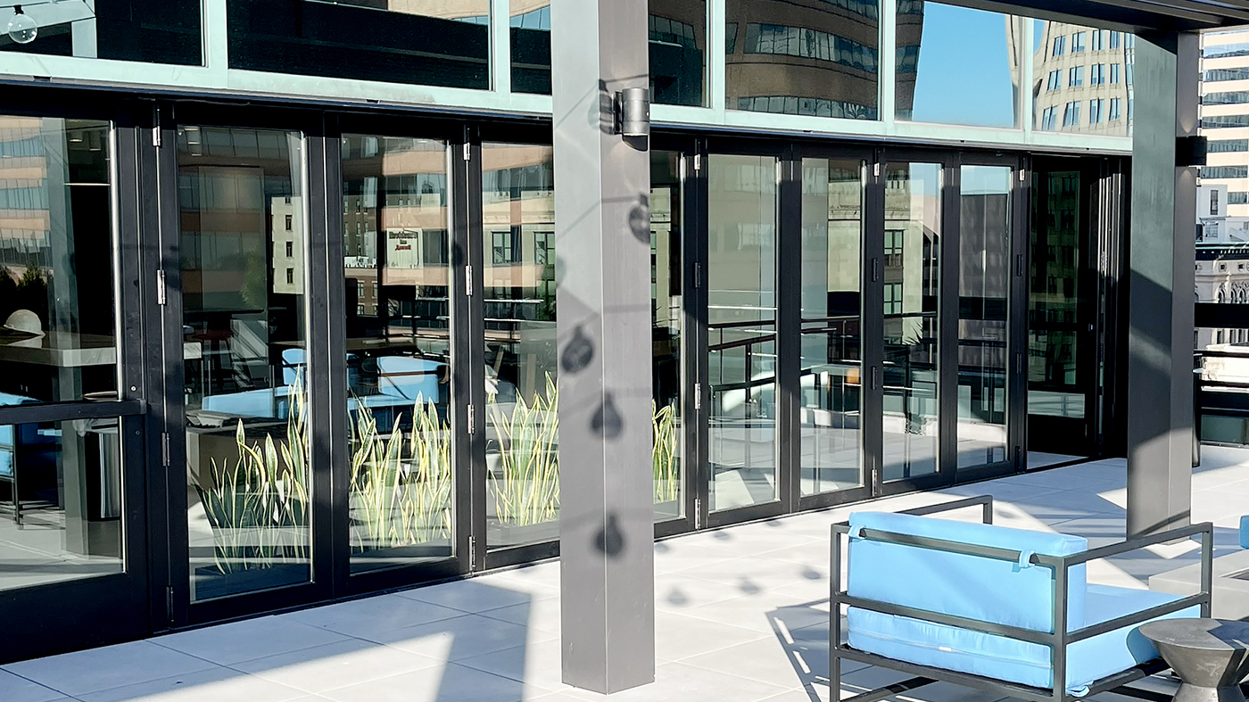 One 10-panel floating bifold door with a black anodized finish