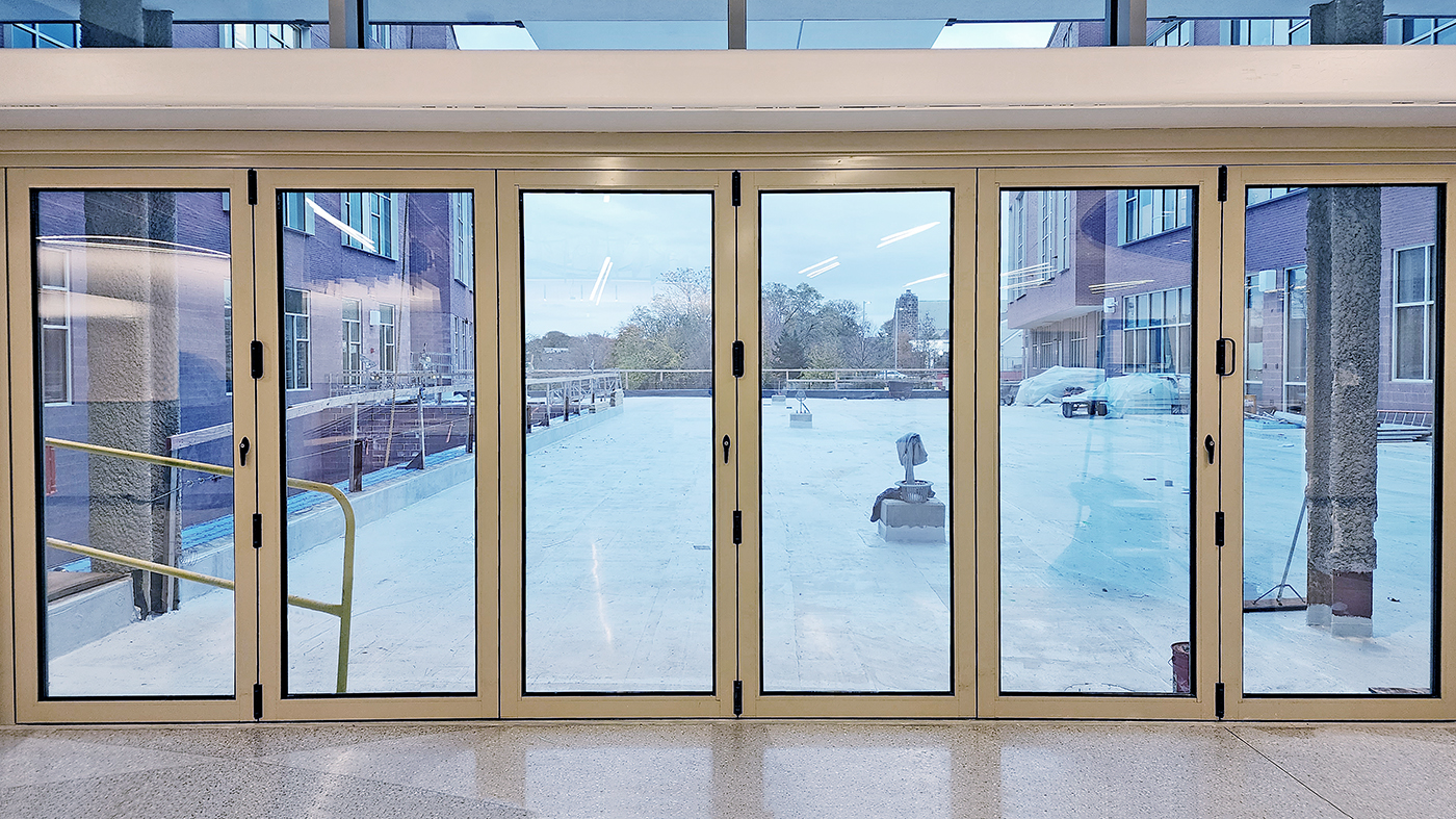 One six-panel G3 outfold all-wall (shown) and one eight-panel infold split-wall G3NT bifold door units.