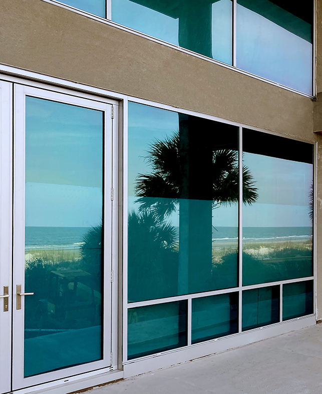37 aluminum curtain walls, two with integrated swing doors, two with integrated sliding glass doors, one with an integrated casement window, and one with an integrated tilt-turn window.