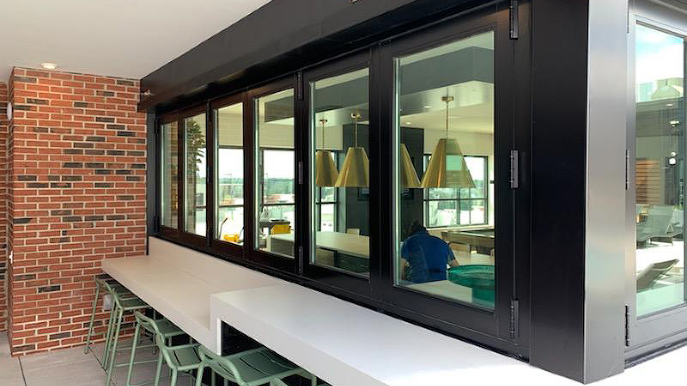 One six-panel and one four-panel G2 outfold all-wall bifold window units.
