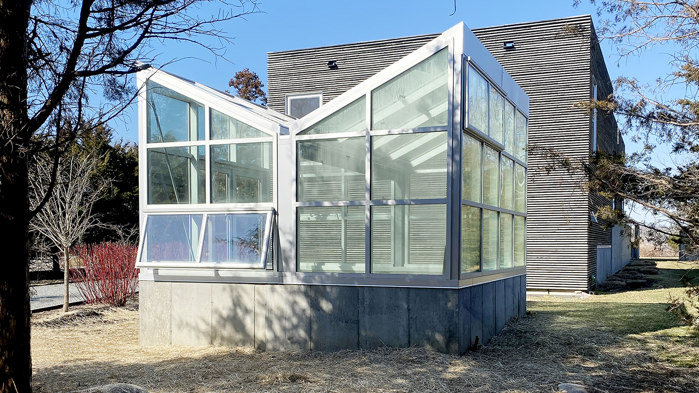 Inverted double pitch greenhouse