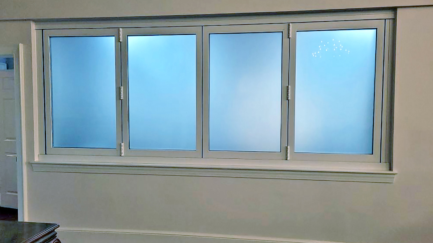 One four-panel bifold window with frosted glass