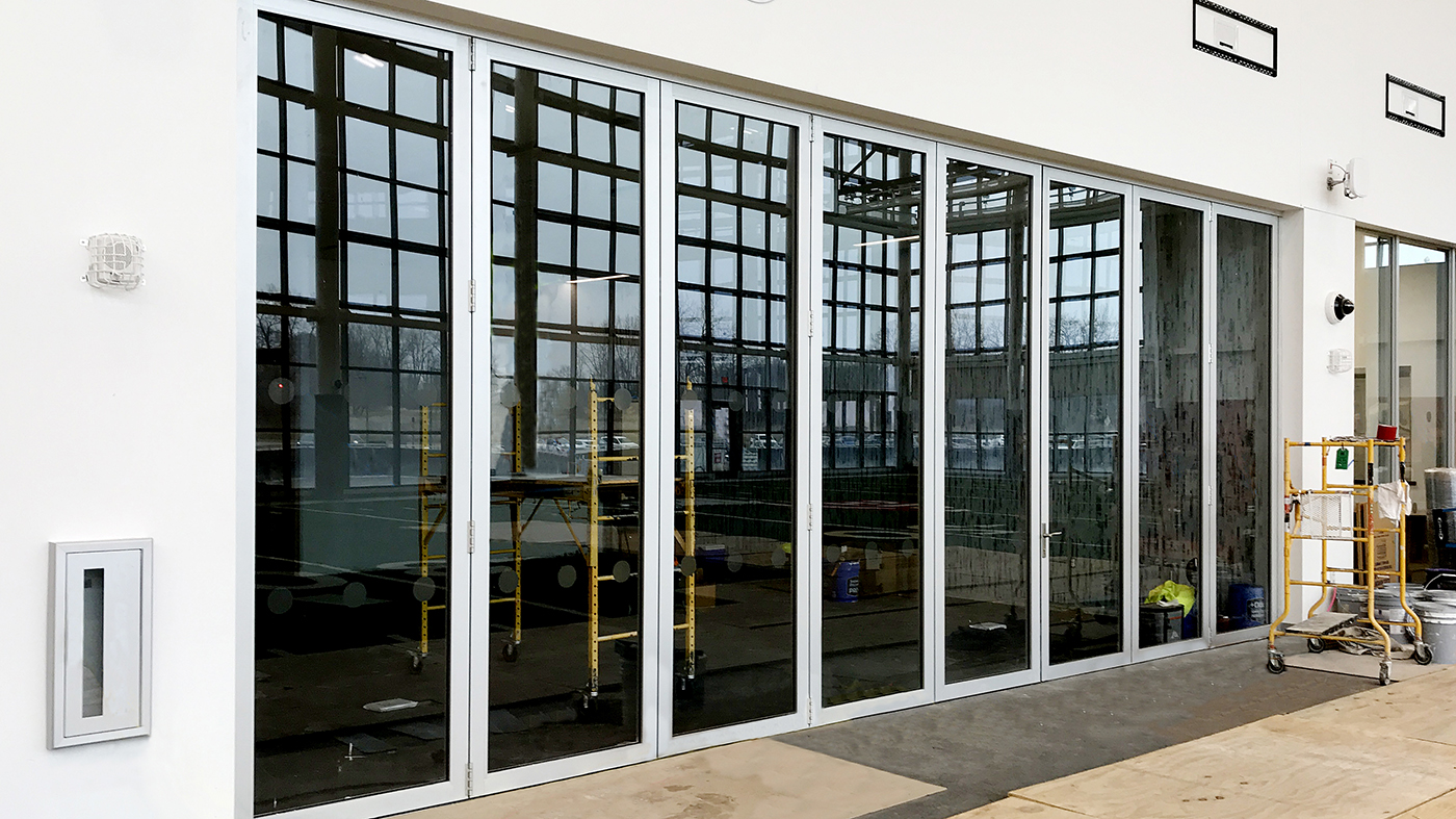 One eight-panel G2 infold single door mid-wall (SDMW) bifold door unit.
