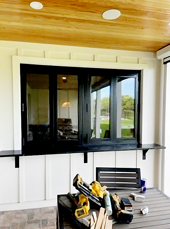 One four-panel G2 outfold split-wall bifold window unit with a floating jamb and door adapter.
