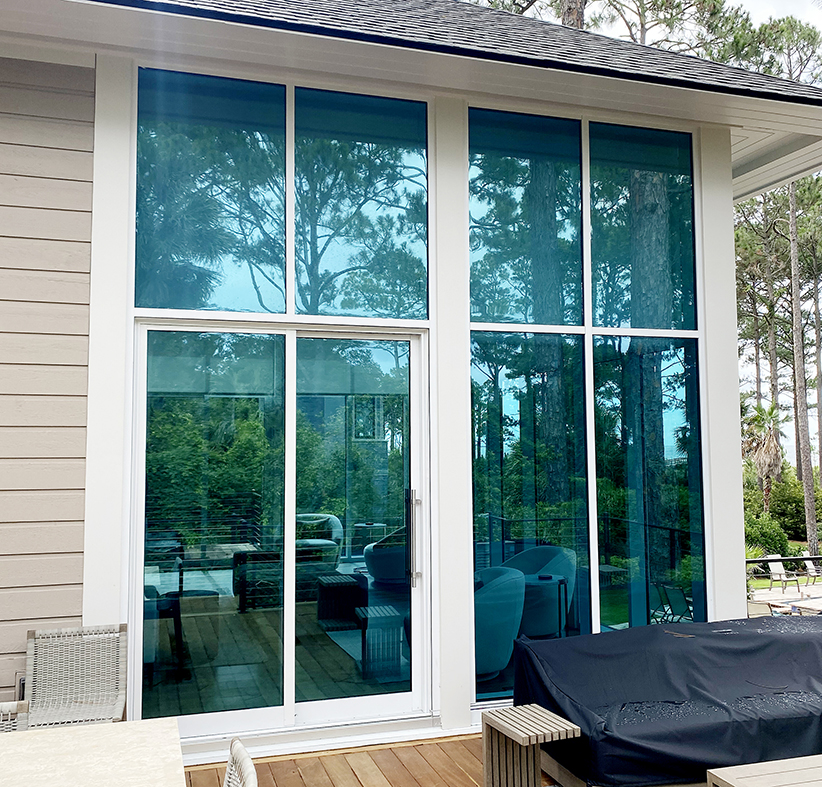 Seven aluminum curtain walls, two of which have integrated two-panel (XO & OX configuration) G2 multitrack sliding glass door units, one four-panel (OXXO configuration) G2 multi-track sliding glass door units, all glazed with LoE 340 insulated glass.