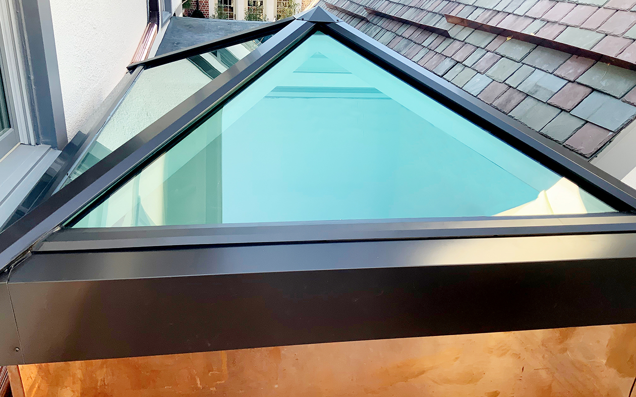 One pyramid skylight with copper exterior flashing