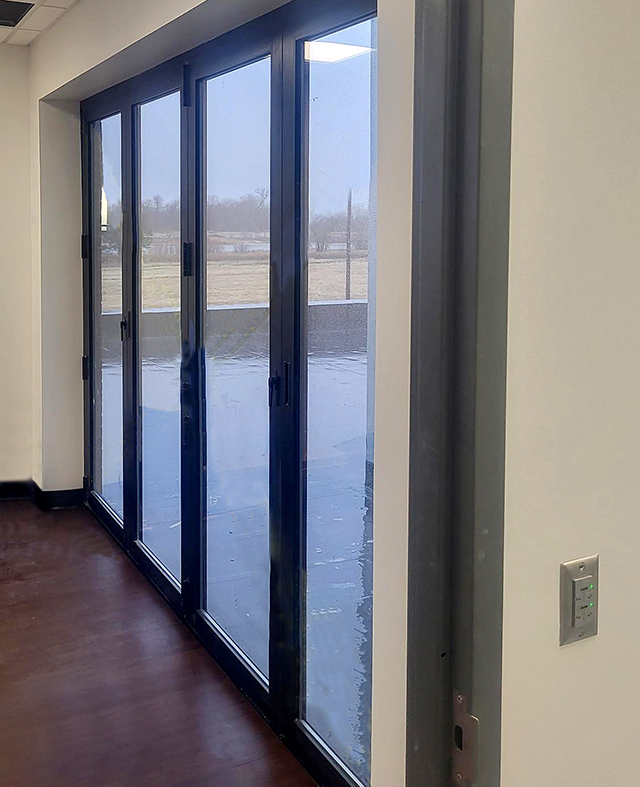 One eight-panel split-wall and one four-panel all-wall G2 infold bifold door units.