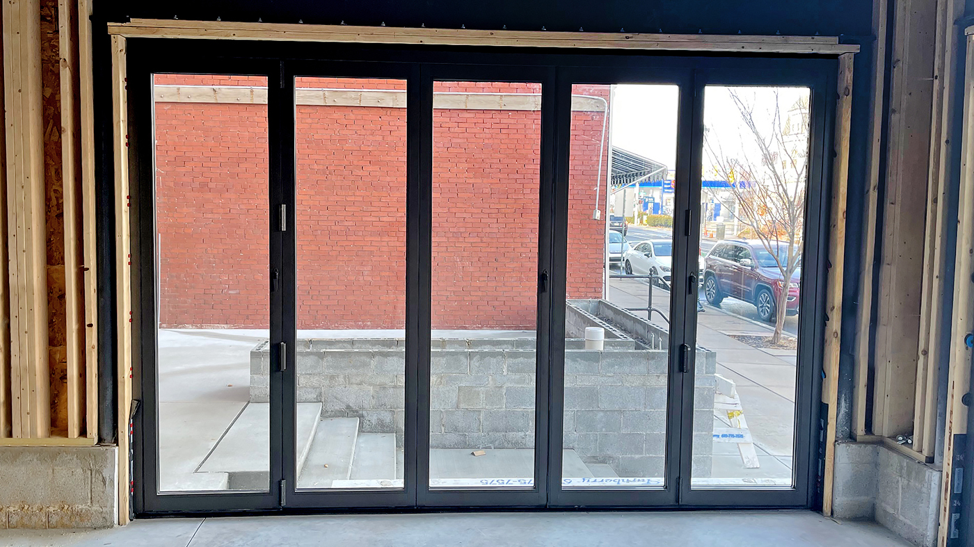 One six-panel and one five-panel bifold door