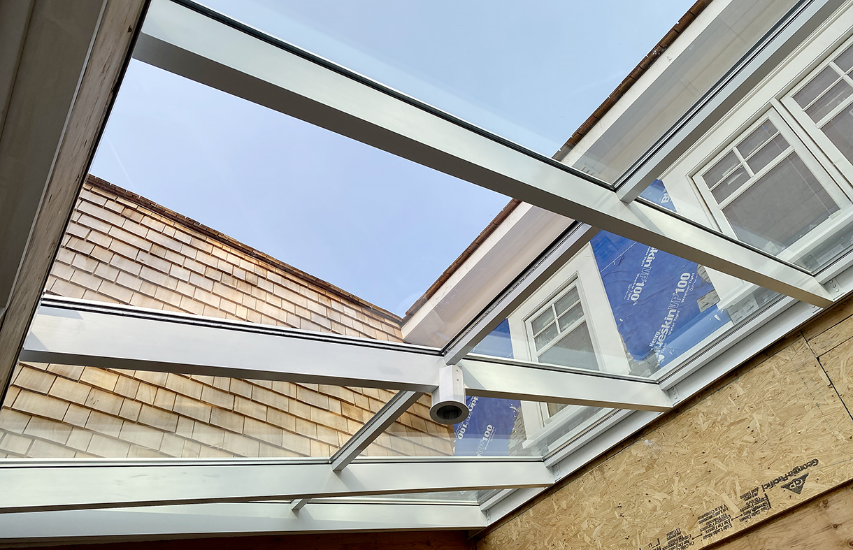 Straight eave lean-to skylight