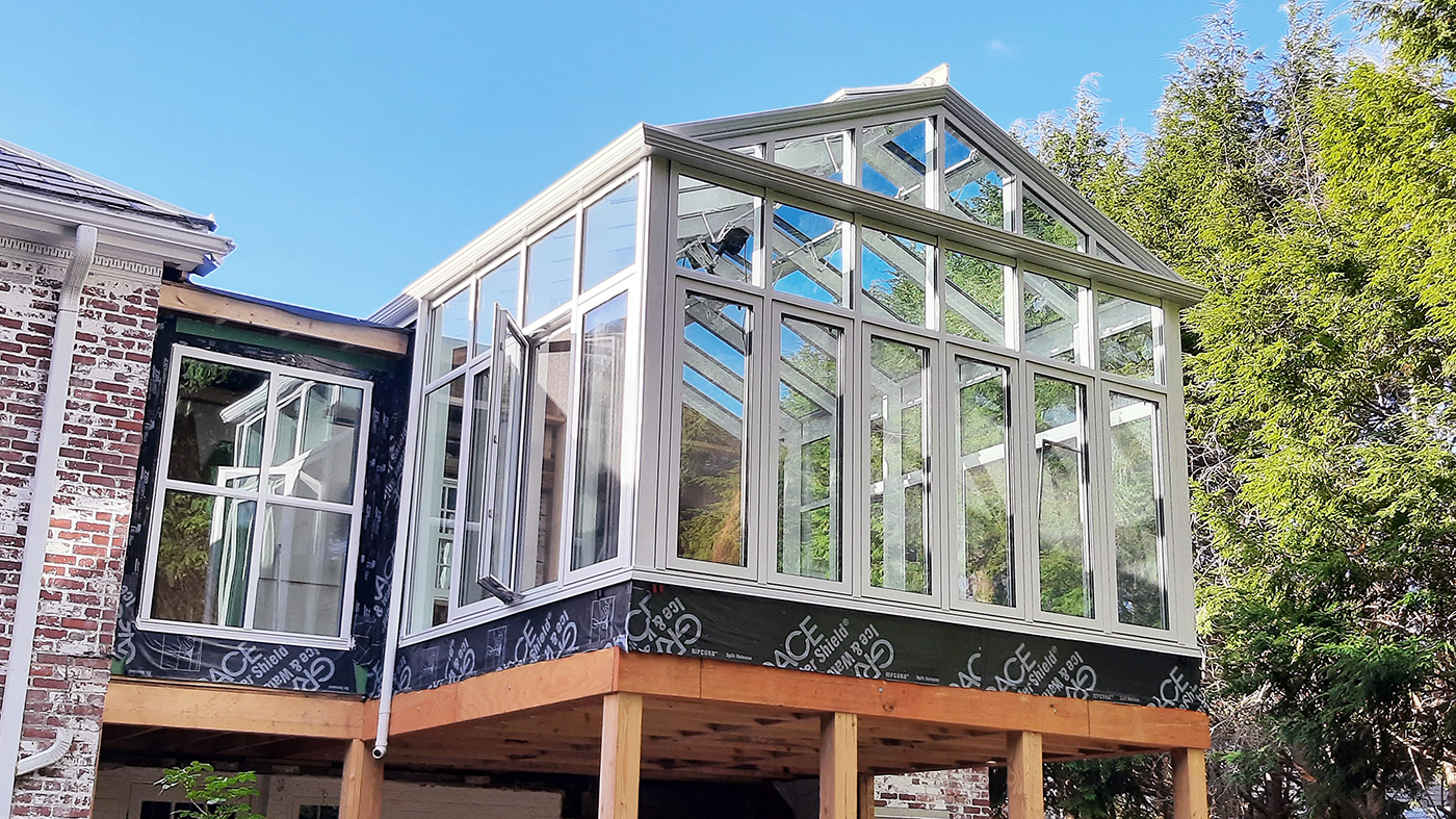 One straight eave double pitch conservatory with 14 casement windows and an additional fixed window