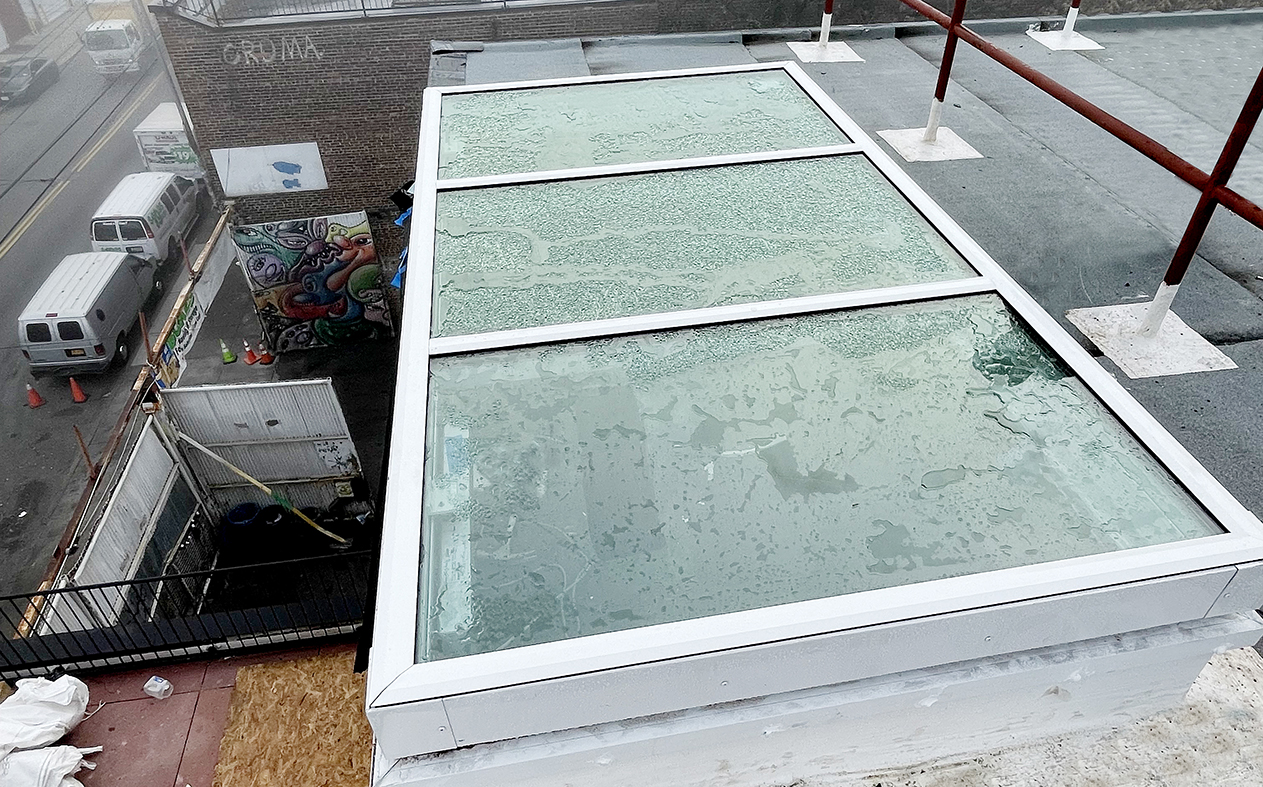 Two operable skylights, three fixed windows, one outswing G2 French door, one four-panel and one six-panel G2 outfold all-wall bifold door units.