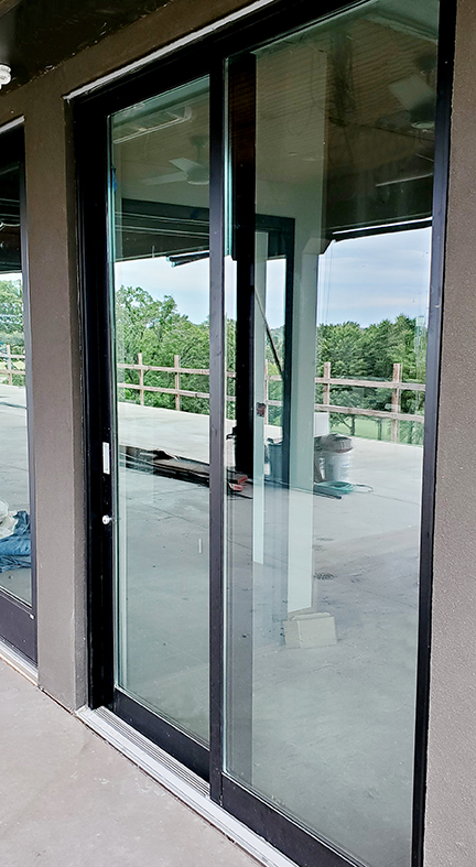 One four-panel (OXXO configuration) and two two-panel (XO configuration) G2 multi-track sliding glass door units. 