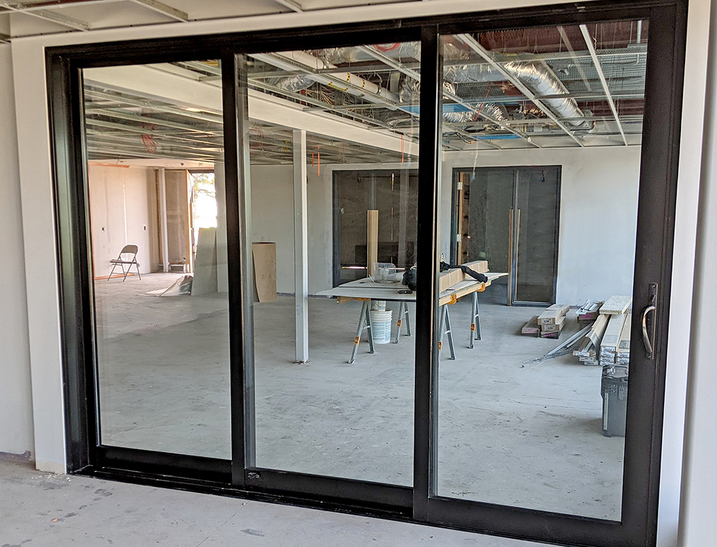 Two three-panel (XXO configuration), and one two-panel (XO configuration) G3 multi-track sliding glass door units.