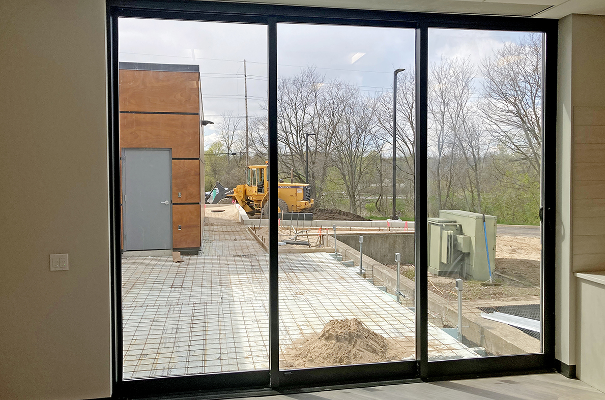 One three-panel (XXO configuration) G2 multi-track sliding glass door unit.