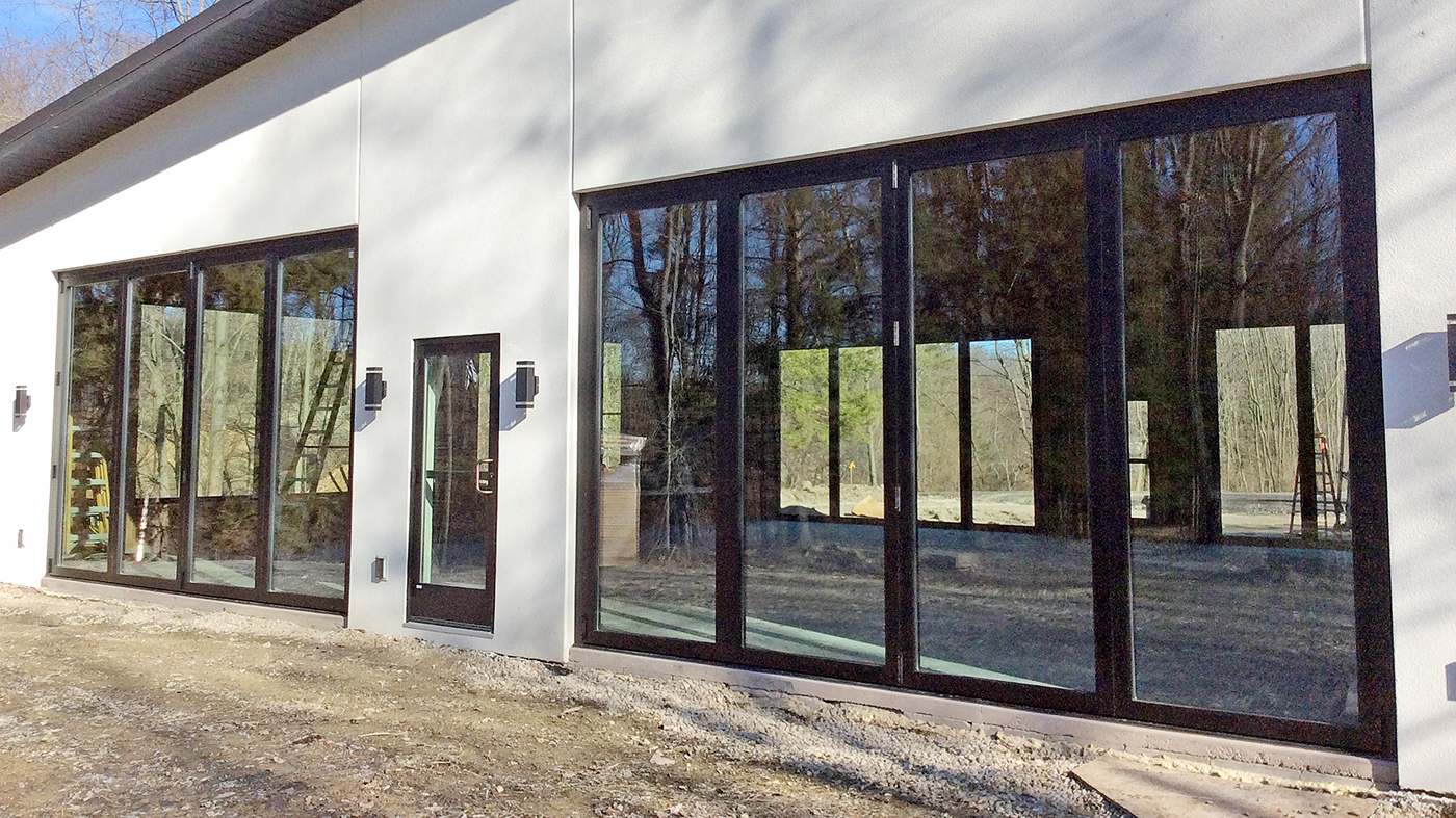 Four four-panel G3 outfold all-wall bifold door units.