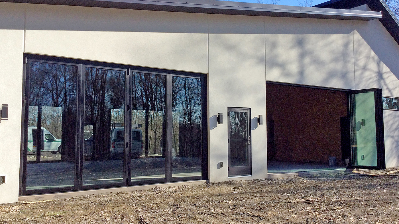 Four four-panel G3 outfold all-wall bifold door units.