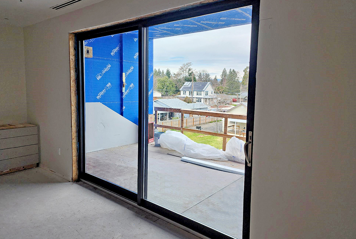 One two-panel (XO configuration) G2 multi-track sliding glass door unit.