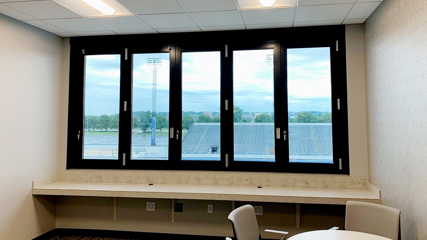 One five-panel and one four-panel G2 infold all-wall bifold window units.