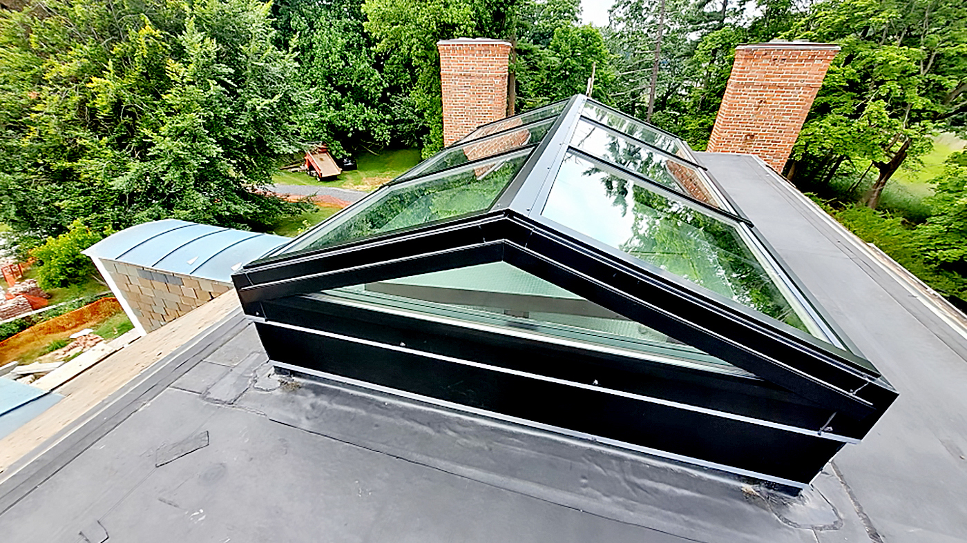 Straight eave double pitch skylight.