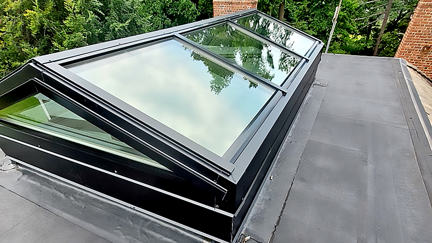 Straight eave double pitch skylight.